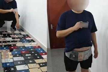 创了此海关走私纪录 男子身绑100台手机进境